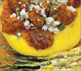  ?? DONNA MAURILLO — CONTRIBUTE­D ?? Greek Meatballs in Spicy Tomato Sauce served with polenta and grilled asparagus.