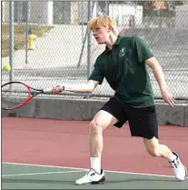  ?? ?? Magnus Daugaard returns a shot in singles over South in the SYML opener. Daugaard had a key 6-1, 6-0 match victory in singles to help Tehachapi to a team win.