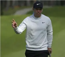  ?? ASSOCIATED PRESS ?? NO DAY AT THE BEACH: Paul Casey waves after putting on the 18th green at Spyglass Hill during yesterday’s third round of the AT&amp;T Pebble Beach Pro-Am.