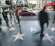  ?? Mel Melcon Los Angeles Times ?? THE PLAN unveiled by Councilman Mitch O’Farrell aims to make the Walk of Fame more welcoming.