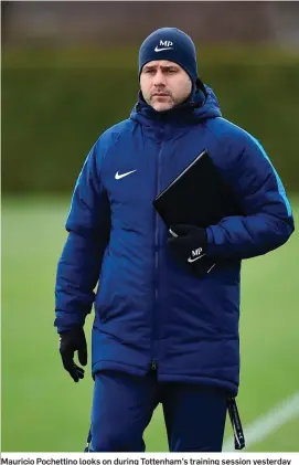  ??  ?? Mauricio Pochettino looks on during Tottenham’s training session yesterday