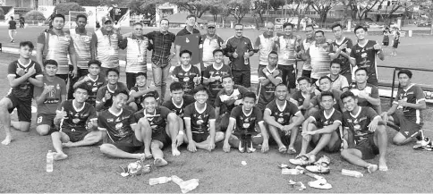  ??  ?? THREE POINTS WON: Sabah under-19 squad officials and players celebrate their 4-1 win over BJSS U-16 in the Youth Cup Group A tie NSC field, Bukit Jalil yesterday.