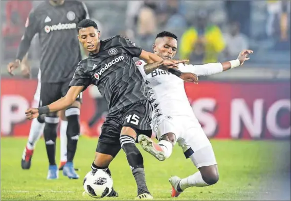  ??  ?? Hot start: Thabang Monare (right) ofBidvest Wits outclassed the Pirates midfield on the way to a 1-0 win. Photo: Lefty Shivambu/Gallo Images