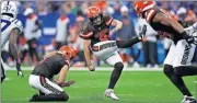  ??  ?? Browns rookie and former Oklahoma standout Austin Seibert kicks against the Colts during Saturday's preseason game in Indianapol­is. [AP PHOTO/JEFF HAYNES, FILE]