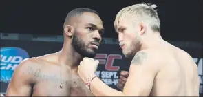  ?? — Photo by The Canadian Press ?? Light-heavyweigh­t championJo­n Jones (left) will face Swedish challenger Alexander Gustafsson in UFC 165 in Toronto tonight.
