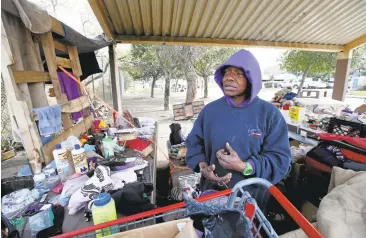  ?? KARLMONDON/STAFF ?? Marie Perry talks in March about living in her Rock Springs homeless camp in San Jose. Her camp was later dismantled by the city, and she said she was told her possession­s would not be stored.