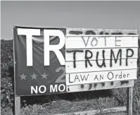  ?? ROBERT LEONARD/ SPECIAL TO THE USA TODAY NETWORK ?? This large political sign near Attica in central Iowa has been through at least four iterations because of vandalism and updates.