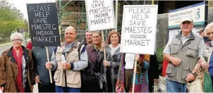  ?? LOUVAIN REES ?? Maesteg Indoor Market traders and customers staged a protest outside the Bridgend council offices earlier this year