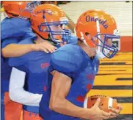  ?? JOHN BREWER - ONEIDA DAILY DISPATCH ?? Oneida senior running back Steven Barrett celebrates with teammates after a second quarter touchdown on Thursday, Aug. 30.