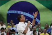  ?? BRUNA PRADO — THE ASSOCIATED PRESS ?? Brazil's President Jair Bolsonaro speaks during a rally to launch his reelection bid, in Rio de Janeiro, Brazil, on Sunday.