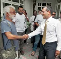  ?? AP ?? Mohamed Nasheed talks to supporters in Male, on Sunday. —