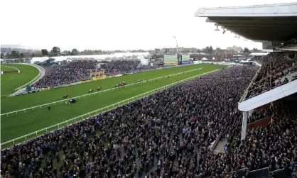  ??  ?? Crowded stands at the Cheltenham festival on 13 March, 10 days before the lockdown began. Photograph: Tim Goode/PA