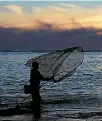  ?? PHOTO: GETTY IMAGES/HAGEN HOPKINS ?? Depending on the tides fishermen are up at the crack of dawn to try their luck.