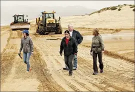  ??  ?? “WE’RE BASICALLY the doormat of the dunes — we get all the negative impacts,” said Cynthia Replogle, left, of the Oceano Beach Community Assn.