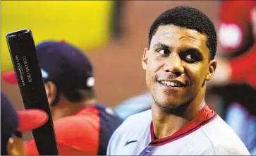  ?? JUAN SOTO Ross D. Franklin Associated Press ?? is a bilingual superstar who oozes charisma and confidence with his smile and approach. At 23, he’s already being compared to Hall of Famers such as Frank Robinson, Hank Aaron and Mickey Mantle.