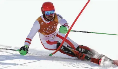  ?? Alexander Hassenstei­n / Getty Images ?? Marcel Hirscher’s prowess in the slalom portion of the combined was enough to help him complete his career objectives.