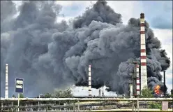  ?? AFP ?? Smoke rises from an oil refinery after an attack outside the city of Lysychans’k in the eastern Ukrainian region of Donbas.