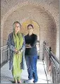  ?? KESHAV SINGH/HT ?? Workers giving final touches to the Ram Bagh Gate which is being restored under the central Hriday project; and (right), the city’s project conservati­on architect Gurmeet Rai with Amritsar municipal commission­er Sonali Giri (extreme right) on Sunday.