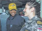  ??  ?? Royal Australian Navy Lt. Claire James (right) and Lt.j.g. Roliza Alfred of Atlanta (left) discuss bridge operations during a tour of the amphibious assault ship USS Bonhomme Richard (LHD 6) during Talisman Saber 17.