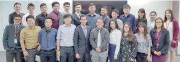  ??  ?? EC students who completed their industrial training are seen with programme head Dennis Chan (back left) and other lecturers.