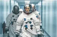  ?? TRIBUNE NEWS SERVICE PHOTO ?? Lukas Haas, Ryan Gosling and Corey Stoll in “First Man.”