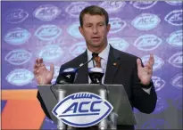  ?? CHUCK BURTON — THE ASSOCIATED PRESS ?? Clemson head coach Dabo Swinney speaks during ACC media day last week in Charlotte, N. C.