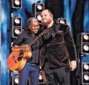  ?? John Shearer/Getty Images for The Recording A ?? Tracy Chapman, left, and Luke Combs perform onstage during the 66th GRAMMY Awards on Sunday, Feb. 4, in Los Angeles, Calif.