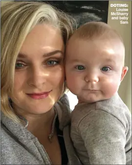  ??  ?? Doting: Louise McSharry and baby Sam