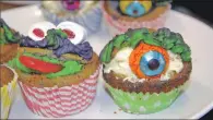  ?? 06_ a44Co- opcharity0­4 ?? Scarily tasty - imaginativ­e cakes created by Caroline Gauld.