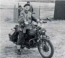  ??  ?? Left: Ed and his British Wwi-era civilian motorbike replica, featuring a gas-lantern headlamp. Below: Ed astride his replica of a WWII British army motorcycle.