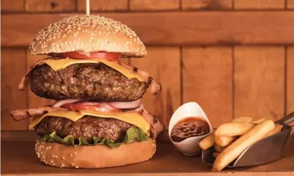  ?? Photograph: Nikos Panidis/Getty Images/EyeEm ?? ‘Bye, bye burgers’ said an on-screen graphic on Fox News, which ran the false claim that the US president would tyrannical­ly allow Americans to devour just one burger a month.