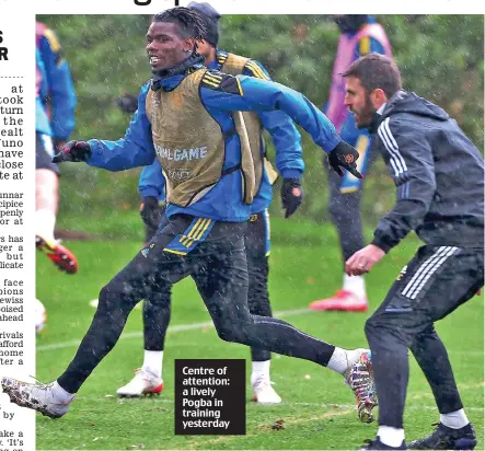 ?? ?? Centre of attention: a lively Pogba in training yesterday