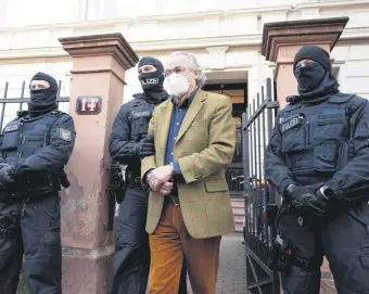  ?? ?? German police special forces detain Heinrich XIII Prinz Reuss after searching a house, Frankfurt am Main, Germany, Dec. 7, 2022. DESIGNER MEHMET MÜCAHİT YILMAZ