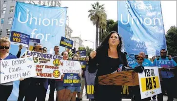  ?? Rich Pedroncell­i Associated Press ?? ASSEMBLYWO­MAN Lorena Gonzalez, author of AB 5, pointed to contractor­s who had been made employees.