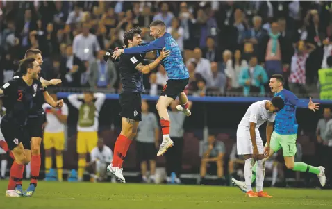  ?? FRANCISCO SECO/ASSOCIATED PRESS ?? Croatia players celebrate after winning the semifinal match against England on Wednesday at the World Cup in Luzhniki Stadium in Moscow. Croatia will face France in the championsh­ip at 9 a.m. Sunday in Moscow.