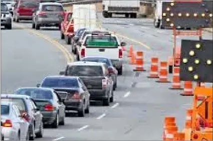  ?? FILE PHOTO ?? The so-called zipper merge is not exactly being embraced by many drivers.