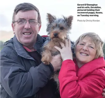  ?? Photo by Christy Riordan. ?? Gerard O’Donoghue and his wife, Geraldine, pictured holding their recovered puppy, Keanu, on Tuesday morning.