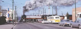  ?? ANGUS MCINTYRE ?? The Royal Hudson steam engine crossing Broadway on the Arbutus corridor in 1977. The train's trip was part of promotiona­l tour set up by then-travel minister Grace Mccarthy and mayor Jack Volrich.