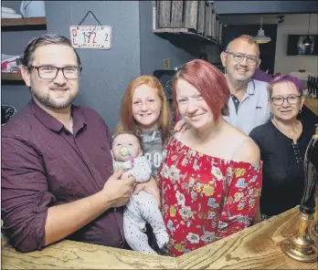  ?? Picture: Habibur Rahman ?? PROUD Oliver and Sara Pollard-Dambach with their children, Chloe-Louise and Olivia-Rose, and Oliver's parents, Chris and Rosie Dambach.