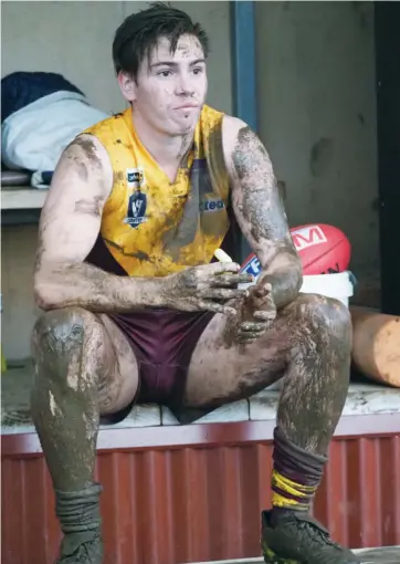  ??  ?? A spell on the interchang­e bench probably came as a bit of a relief for Drouin-on-baller Cambell Jolly who spent plenty of time at the bottom of the packs in the match against Maffra played in cold, wet, windy and slippery conditions. Photograph­s: Paul...