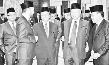  ??  ?? Chief Minister Datuk Seri Panglima Mohd Shafie Haji Apdal with Prime Minister Tun Mahathir Mohammad and Menteri Besar and Chief Ministers from other states at the 249th Rulers Council Meeting in Istana Negara on Thursday.