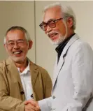  ?? Photograph: Koji Sasahara/AP ?? Animated friends: Studio Ghibli’s Toshio Suzuki, left, and Miyazaki, at a news 2013 conference in Tokyo announcing Miyazaki’s previous retirement.