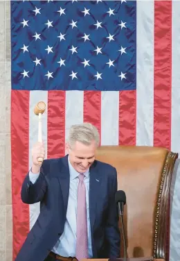  ?? ANDREW HARNIK/AP ?? House Speaker Kevin Mccarthy, R.-calif., holds the gavel on the House floor early Saturday at the U.S. Capitol in Washington.