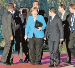  ?? REUTERS ?? Merkel, a su llegada a la sede de la reunión en Marruecos