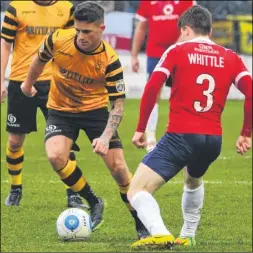  ?? Picture: Steve Terrell ?? Maidstone’s Jack Paxman takes on York defender Alex Whittle
