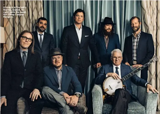  ??  ?? STRINGS ATTACHED: Martin, seated, far right, with his band, the Steep Canyon Rangers.