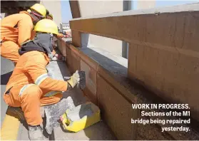  ??  ?? WORK IN PROGRESS. Sections of the M1 bridge being repaired yesterday.