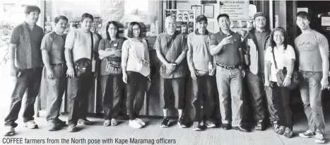  ??  ?? COFFEE farmers from the North pose with Kape Maramag officers