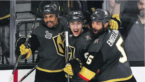  ?? ETHAN MILLER/GETTY IMAGES ?? Tomas Nosek, centre, of the Golden Knights reacts after scoring the game-winning goal in Monday’s Game 1 of the Stanley Cup final in Las Vegas.