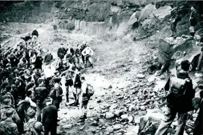  ??  ?? Standing ( far right in shorts) at Kinder Scout, 21-year-old Benny Rothman exhorts the crowd to “mass trespass”